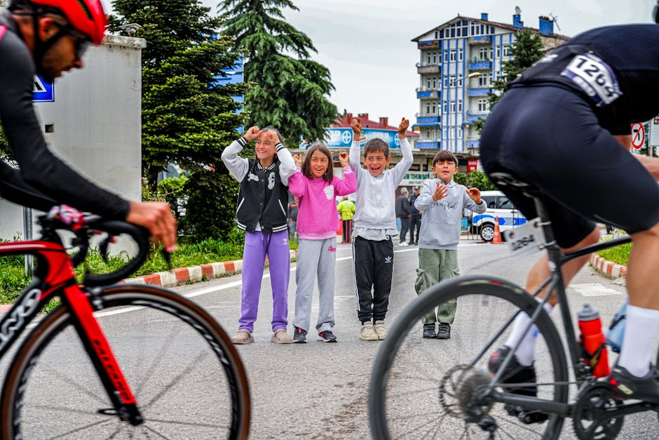 Cursa Copiilor din Turul României: micii cicliști premiați de Virgil Nanu