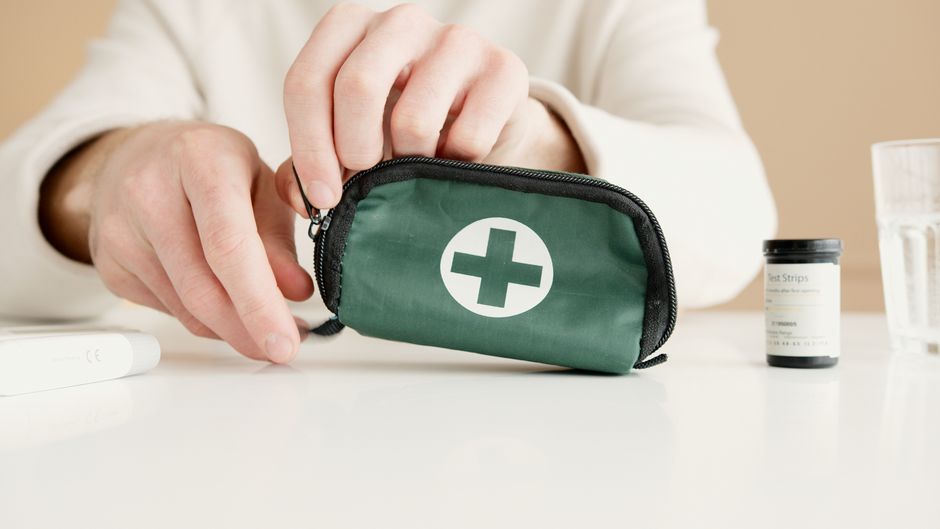 Essentials for a family first aid kit during summer travels with kids